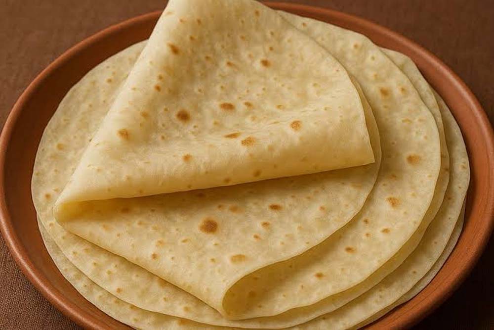 घर पर बनाएं होटल जैसी पतली और मुलायम रुमाली रोटी, तवे पर ऐसे करें तैयार